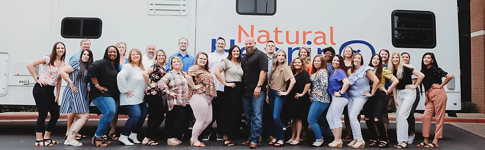 Natural Hearing Centers team