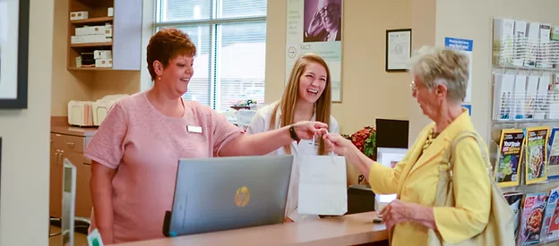 Rogers clinic staff consults patient