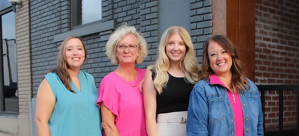 Natural Hearing Centers care team gathered at the Hot Springs clinic in Arkansas