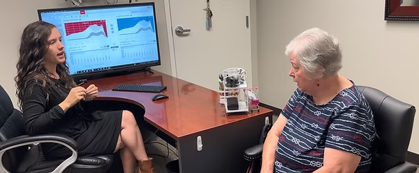 Natural Hearing Center patient meets specialist